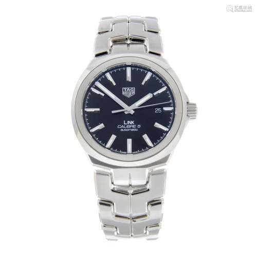 CURRENT MODEL: TAG HEUER - a Link Calibre 5 bracelet watch.