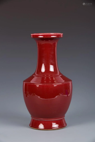 A MONOCHROME RED GLAZED ZUN VASE