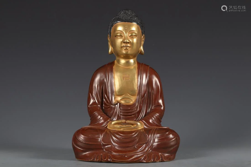 GOLD-PAINTED RED GLAZED PORCELAIN BUDDHA FIGURINE