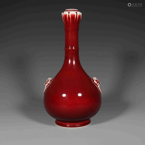 A RUBY RED GLAZED GARLIC-HEAD BOTTLE VASE