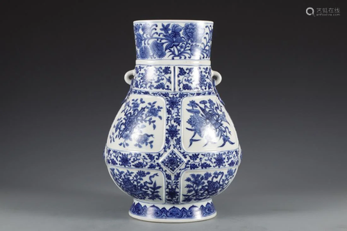 A BLUE AND WHITE DOUBLE-EAR ZUN VASE