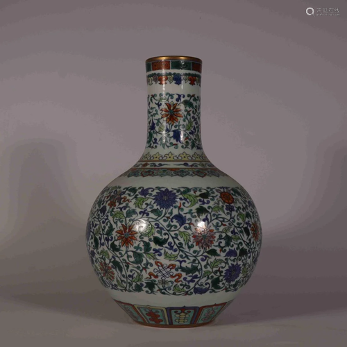 A DOUCAI FLORAL CELESTIAL VASE