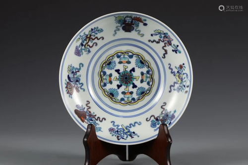 A DOUCAI 'EIGHT IMMORTALS' FLORAL PLATE