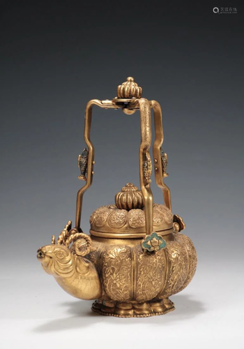 A GILT BRONZE 'RAM' LOOP-HANDLED TEAPOT