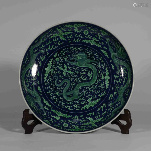 A BLUE GROUND GREEN GLAZED 'DRAGON' PLATE