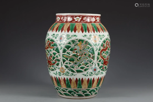 A WUCAI 'DRAGON & WAVES' PORCELAIN JAR