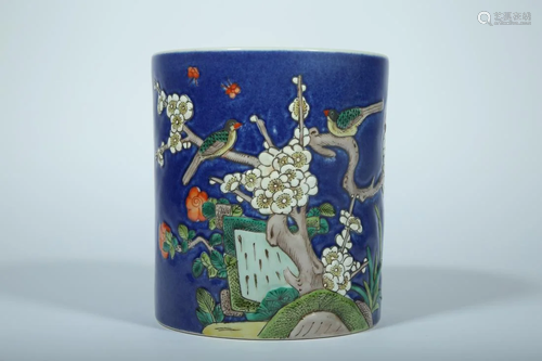 A BLUE GROUND FAMILLE ROSE 'FLOWER' BRUSH POT