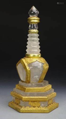 A GOLD COVERED CRYSTAL CARVING DAGOBA