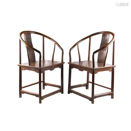 A PAIR OF HUANGHUALI OR ZITAN ARMCHAIRS, QUANYI (Y)