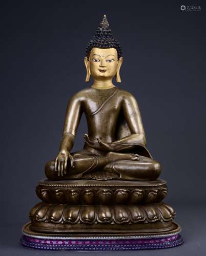 A Gilt Bronze Statue Of Shakyamuni