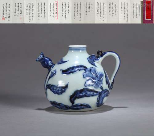 A BLUE AND WHITE FLORAL TEAPOT FROM COLLECTION OF FAMILY SAK...