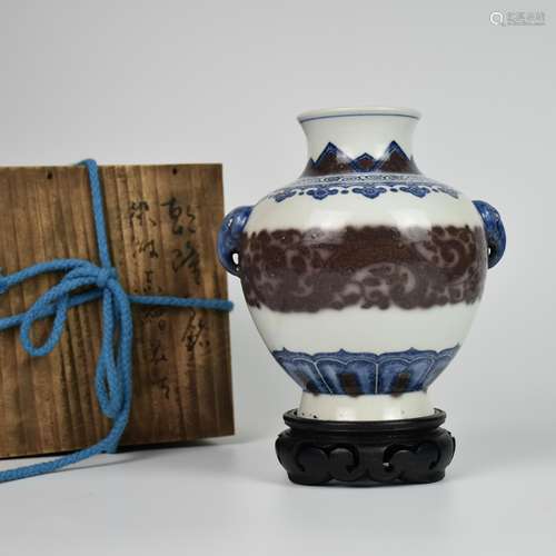 AN UNDERGLAZED-BLUE AND COPPER-RED FLORAL CHI-DRAGON-EARED V...