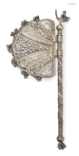 A silver ceremonial axe, India, early 20th century, the fan-...