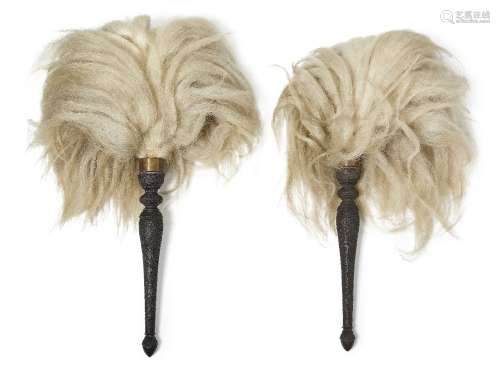 A pair of large ceremonial carved ebony fly whisks (Chaur Sa...