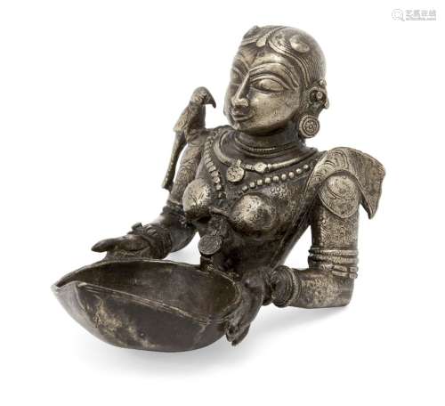 The upper section of a finely moulded brass figure of Meenak...