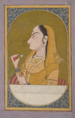 Lady holding a Wine Cup, by a Pahari artist working in the G...