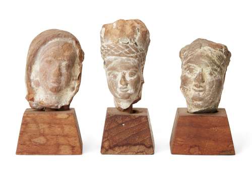 Three small sandstone carved heads, Gupta period, India, 3rd...