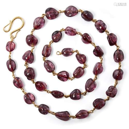 A spinel necklace, India, with thirty-seven polished spinels...