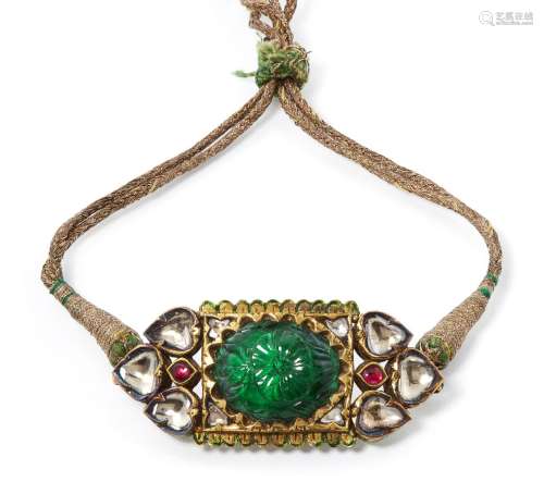 An emerald and diamond-set enamelled gold bazuband by repute...