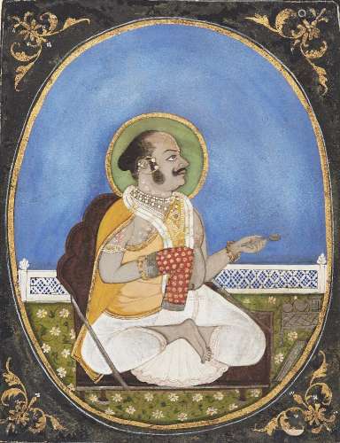 A seated Gosain (Holy man) of the Vallabhalarya sect of Vais...