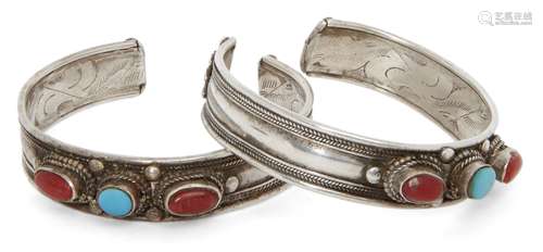 Two coral and turquoise set silver cuff bracelets, India, 20...