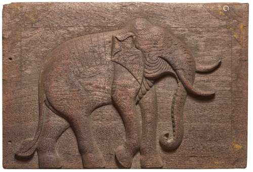 A carved wood panel in relief of an elephant, Rajasthan, Ind...