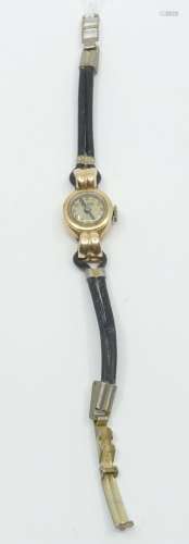 Montre bracelet de dame, la montre de forme ronde en or jaun...