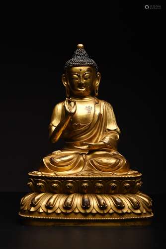 A Gilt Bronze Statue Of Shakyamuni