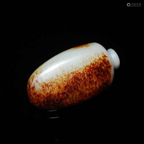 A Hetian White And Russet Jade Snuff Bottle