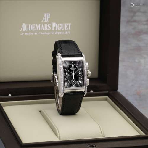 Audemars Piguet. An 18K white gold and diamond set automatic...