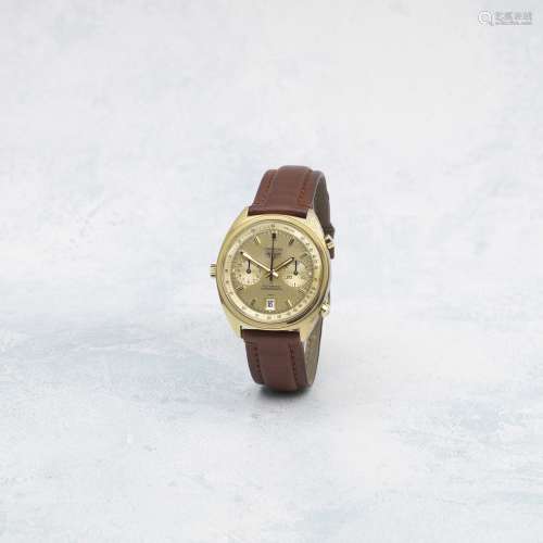 Heuer. An 18K gold automatic calendar chronograph wristwatch...