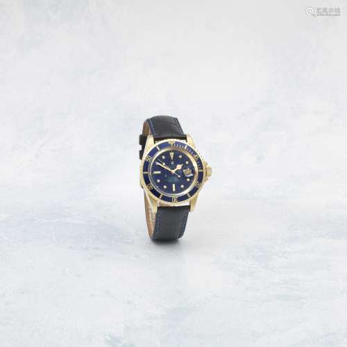 Rolex. An 18K gold automatic calendar wristwatch with tropic...