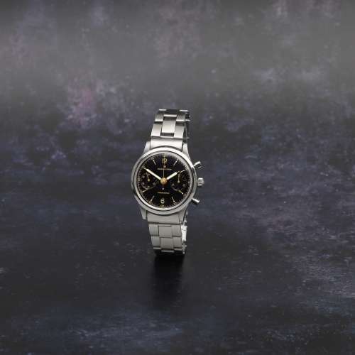 Rolex. A stainless steel manual wind chronograph bracelet wa...