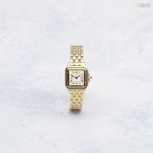 Cartier. A lady's 18K gold quartz rectangular bracelet watch...