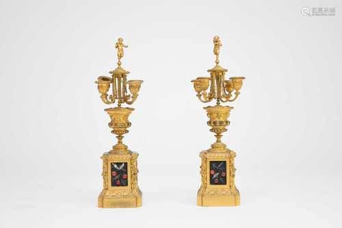 A pair of late 19th century, French ormolu four-branch cande...