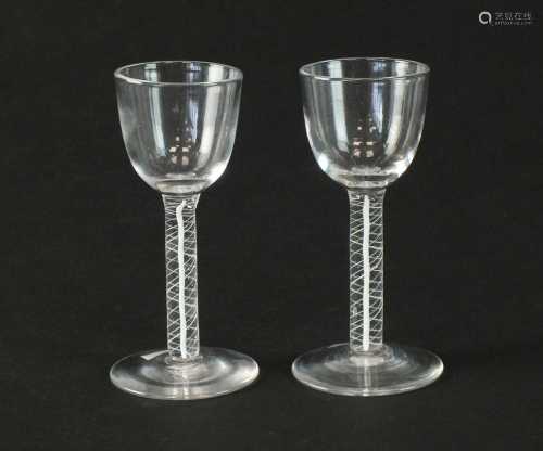 Two opaque twist wine glasses