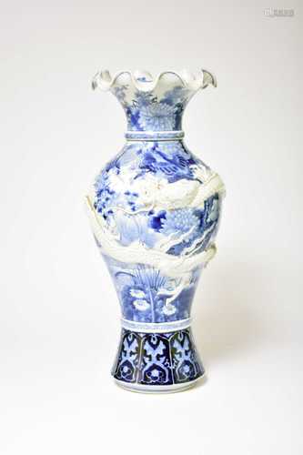 A large Japanese Arita blue and white dragon vase