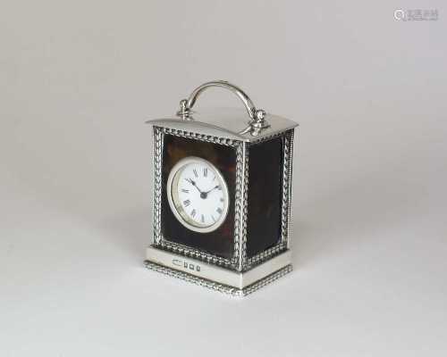 A silver and tortoiseshell mounted carriage timepiece