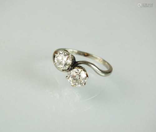 A two stone diamond crossover ring