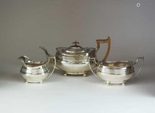 A three piece silver tea service