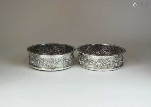 A pair of late Victorian silver mounted Magnum wine coasters