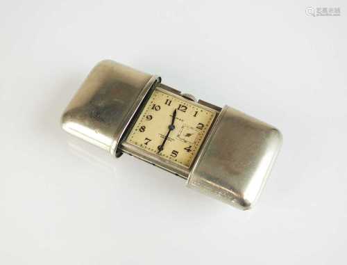 A white metal Movado Chronometre Ermeto purse watch