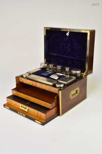 A Victorian brass-inlaid rosewood dressing case with silver ...