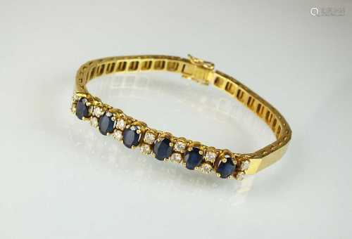 A sapphire and diamond line bracelet