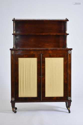 An early 19th century rosewood veneered bookcase