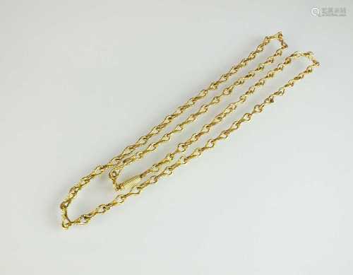 A textured yellow metal chain necklace