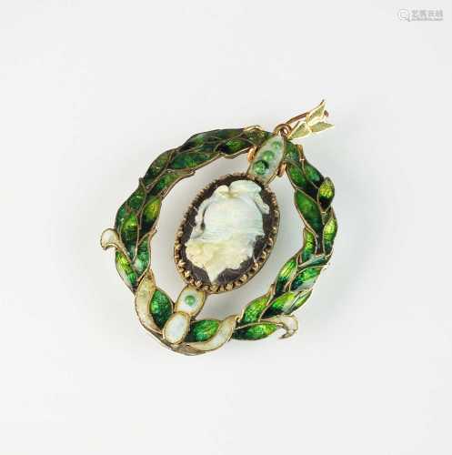 A carved opal cameo and enamel pendant, in the manner Wilhel...