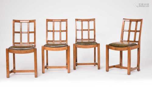 A set of four oak Arts and Crafts style trellis-back standar...