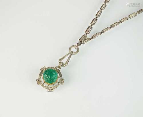 An Art Deco emerald and diamond pendant on chain