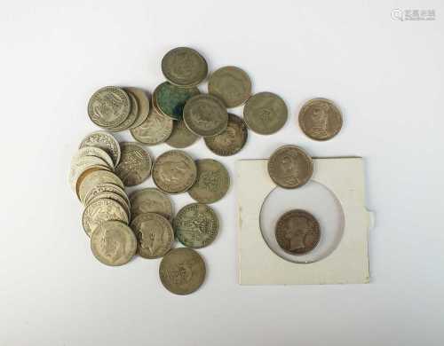 A collection of silver shillings